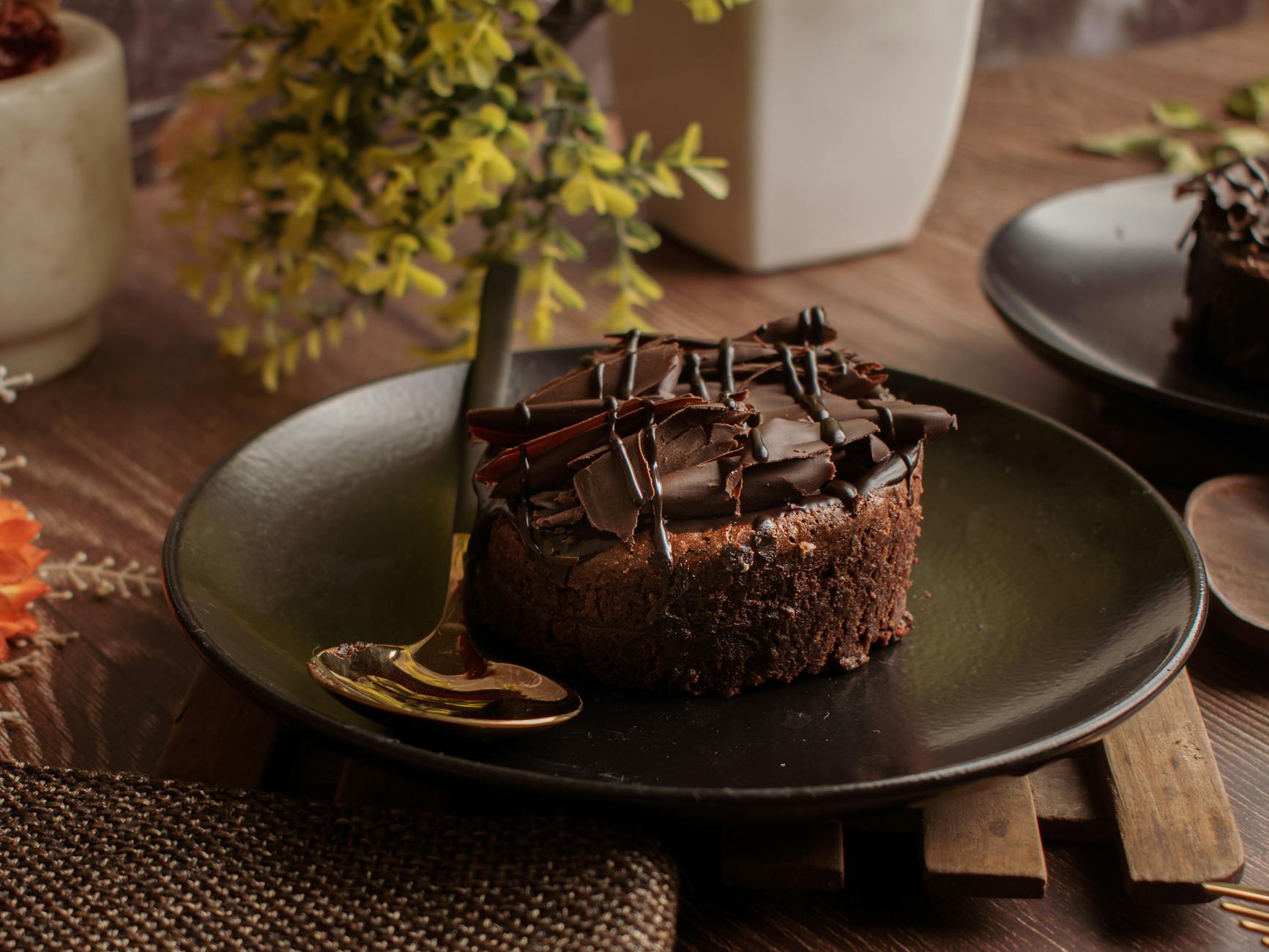 chocolate cake on black round plate